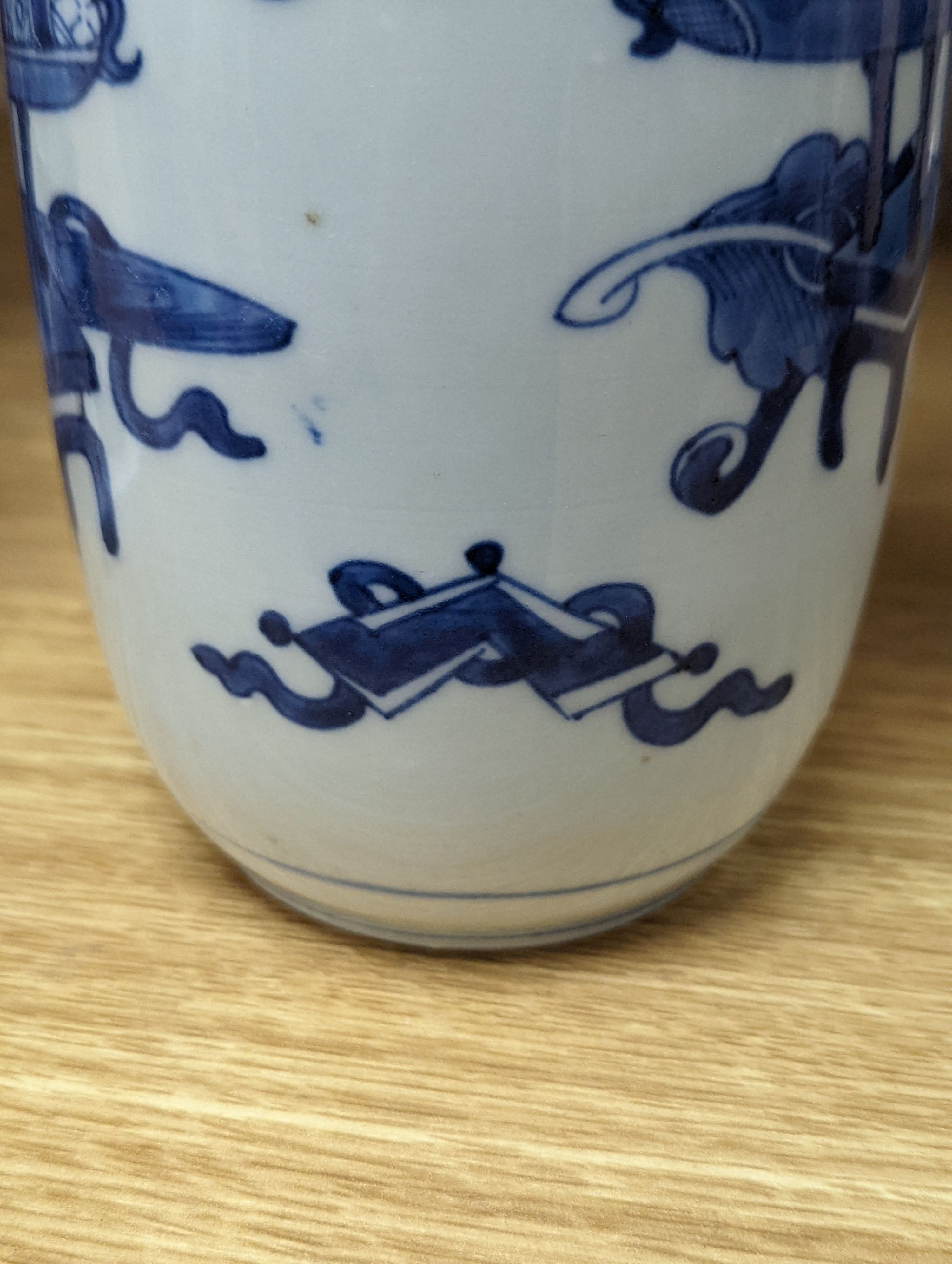 A Chinese blue and white ‘Antiques’ vase, 19.5 cms high.